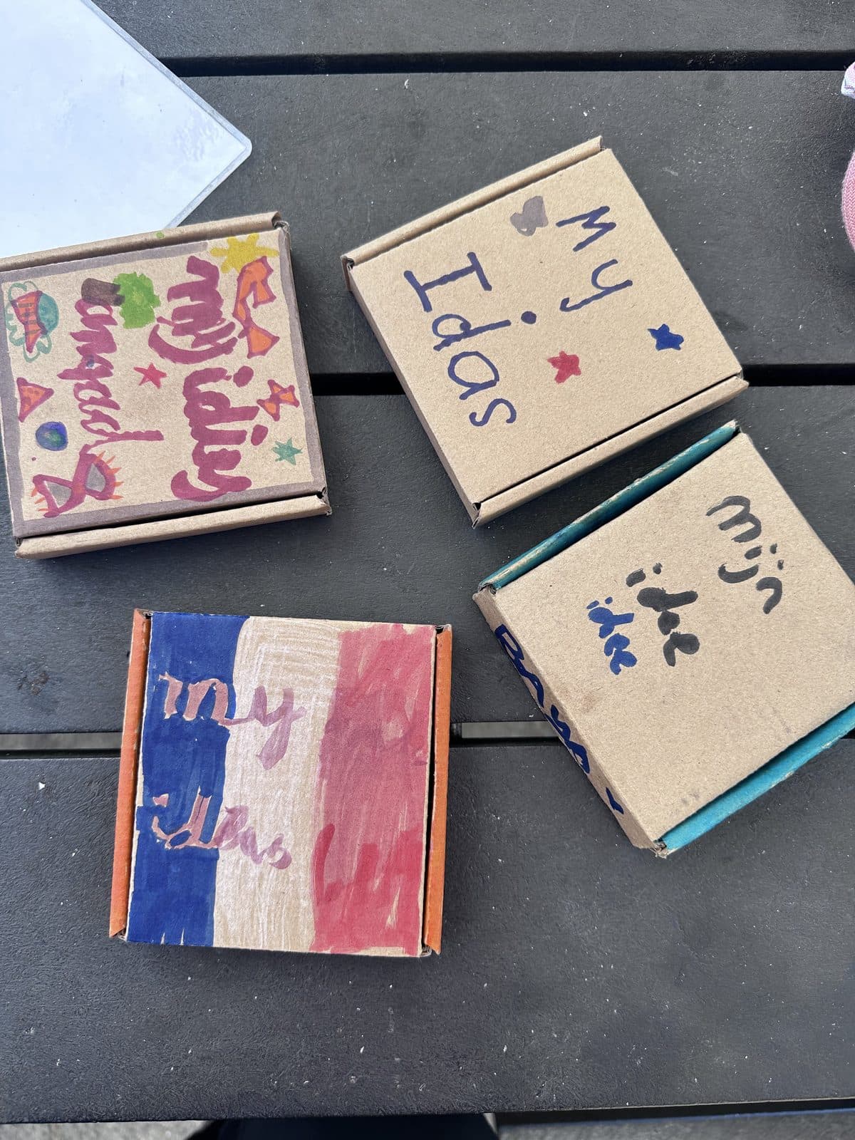 Hand-decorated cardboard idea boxes